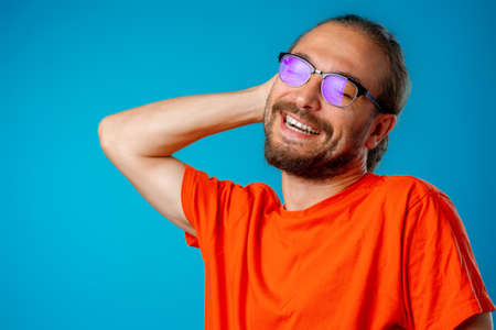 Portrait of a funny nerd man in glassesの写真素材