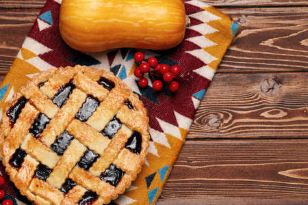 Top view of a thanksgiving pie on brown wooden tableの写真素材