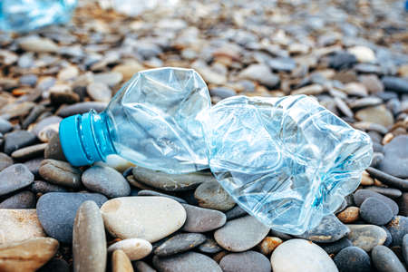 Plastic bottle trash left on a beachの写真素材