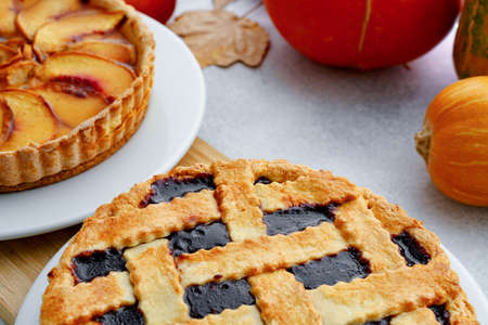 Apple pie and berry tart pie autumn composition