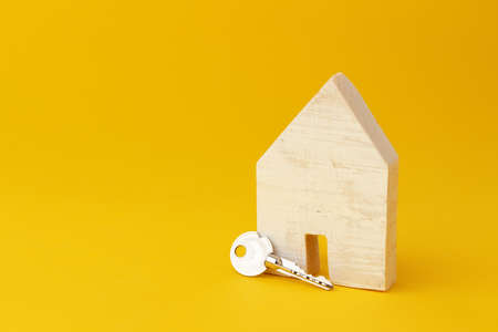 Wooden house model miniature and house keysの写真素材