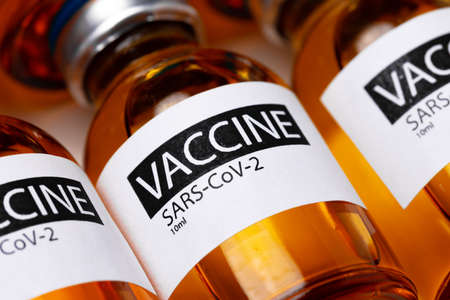 Pile of vials of Sars-cov-2 vaccine close upの写真素材