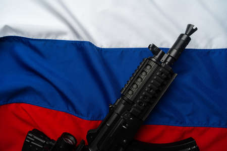Flag of Russia and rifle gun on it