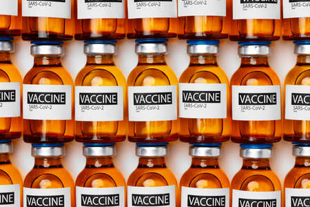 Pile of vials of Sars-cov-2 vaccine close upの写真素材