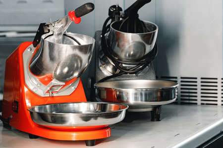 Proffesional new citrus juicers on shelf in a shopの写真素材