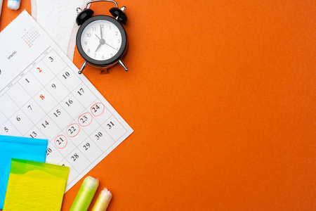 Menstruation calendar with sanitary pads and tampons, pillsの写真素材