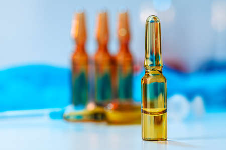 Plain ampule vials for injections close up