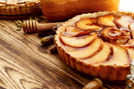 Close up of an apple tart pie on wooden tableの写真素材