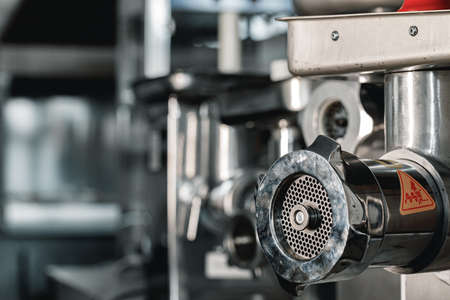 Indutrial new meat grinder close up in a shopの写真素材