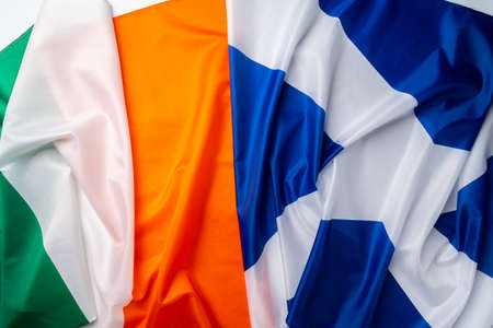 Flags of Scotland and Ireland folded togetherの写真素材