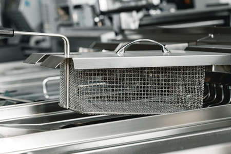 New industrial deep fryer equipment close up