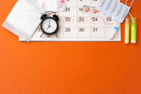 Menstruation calendar with sanitary pads and tampons, pillsの写真素材