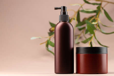 Brown plain cosmetic package on beige backgroundの写真素材