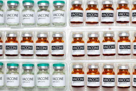 Pile of vials of Sars-cov-2 vaccine close upの写真素材
