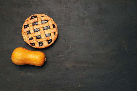 Berry tart pie on black background top view