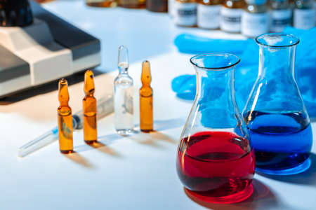 Vial of vaccine bottle with a syringe close upの写真素材