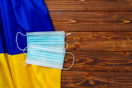 Medical face mask on the flag of Ukraineの写真素材