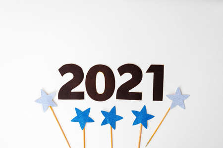 Number 2021 with stars decoration on white background