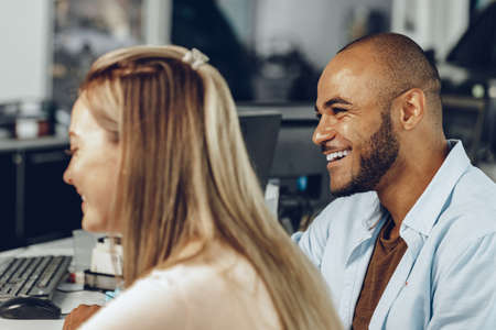 Man and woman having a talk in officeの写真素材