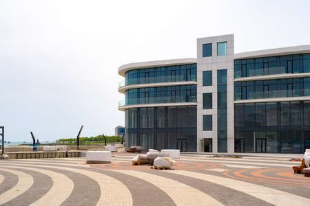 Modern office building with large windows just finishedの写真素材