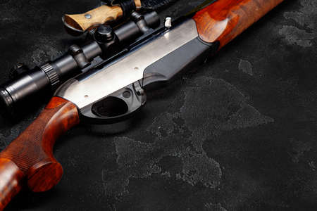 Trigger of a rifle on black backgroundの写真素材