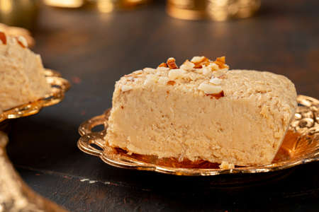 Piece of turkish halva on metal plate