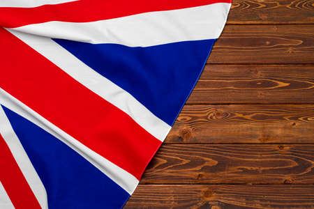 Flag of United Kingdom on wooden background