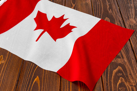 Flag of Canada on wooden background, copy spaceの写真素材