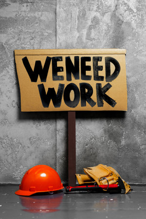 Ptotestive placards against job loss during coronavirus pandemicの写真素材