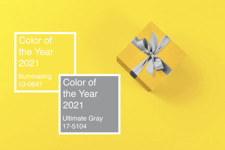 Gift box on yellow background top viewの写真素材