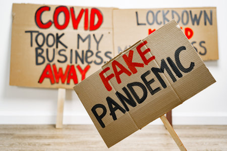 Protestive placard against coronavirus lockdowns close up