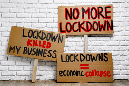 Protestive placard against coronavirus lockdowns close up