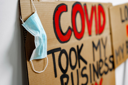 Protestive placard against coronavirus lockdowns close up
