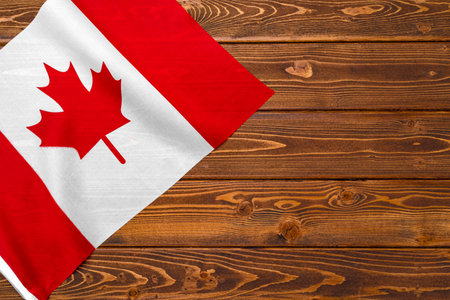 Flag of Canada on wooden background, copy spaceの写真素材