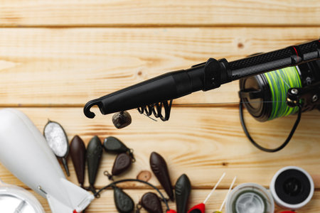 Fishing gear on wooden background close upの写真素材