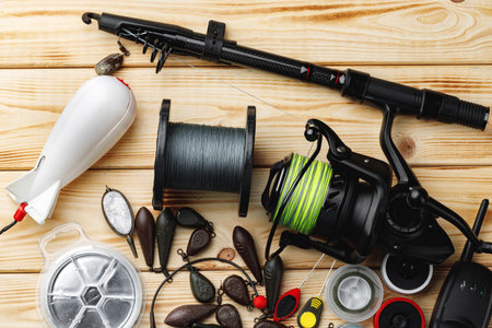 Fishing gear on wooden background close upの写真素材