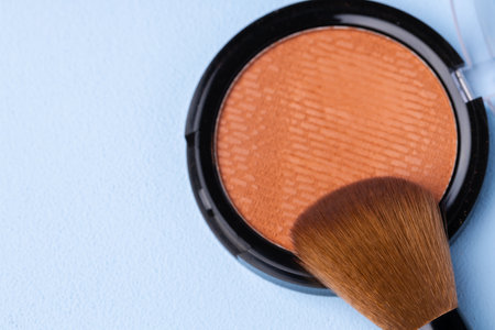 Decorative cosmetics face powder and brush close upの写真素材