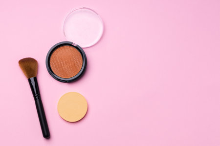 Decorative cosmetics face powder and brush close upの写真素材