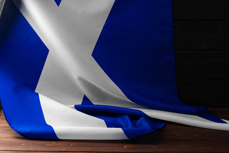 National flag of Scotland on wooden boardの写真素材