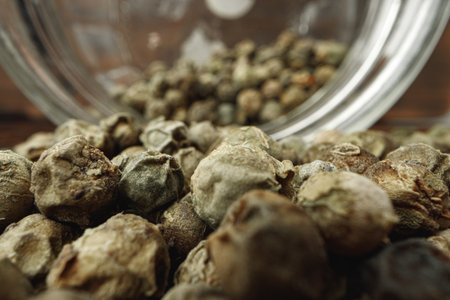 Macro photo of.green peppercorns on table