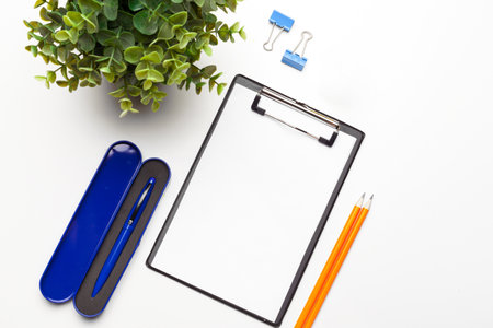 Home office workspace mockup with clipboard. Flat lay, top view. Template for blog, bloger, businessの写真素材