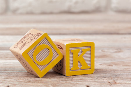Wooden toy Blocks with the text: okの写真素材