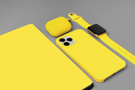 Yellow notepad with smartphone, smartwatch and earphones on gray background