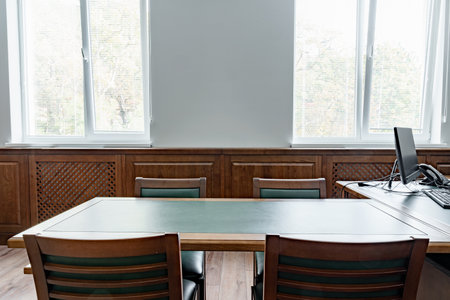 Luxury executive office with desk and armchairs