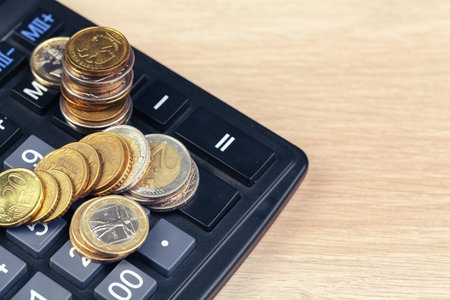 stack of coins and calculator,concept idea for business financeの写真素材