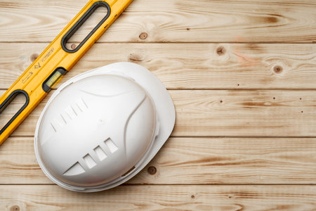 Hardhat helmet and construction level top view