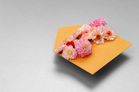 Blank paper with copy space and flower buds