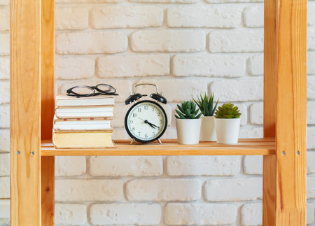 Wooden rack shelf with home decor stuffの写真素材