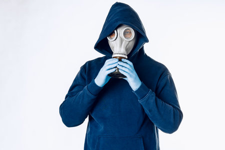 Portrait of a man in a gas mask. Panic during quarantine. Coronavirus pandemiaの写真素材
