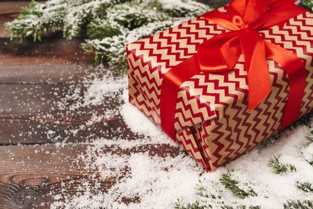 Wrapped gift for winter holidays background with copy spaceの写真素材